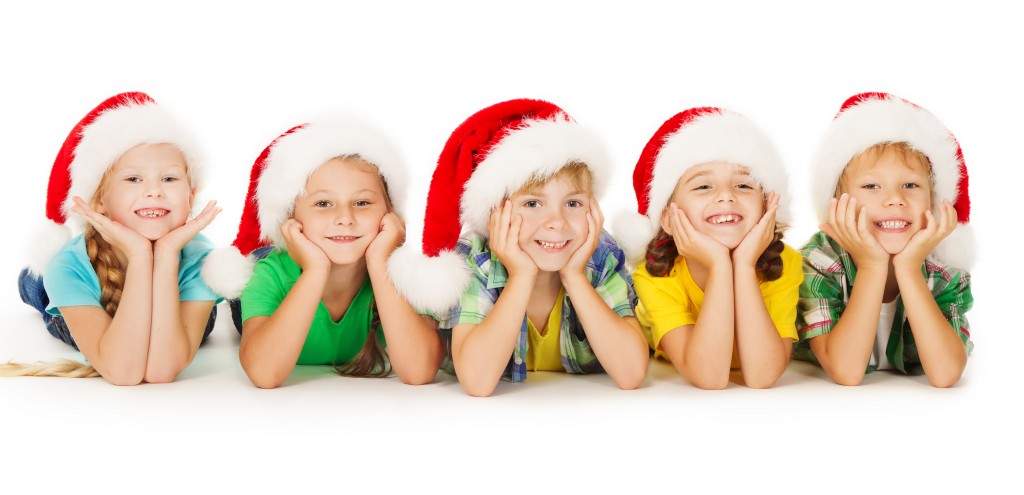 bigstock-Christmas-Kids-Smiling-In-Red--51937558